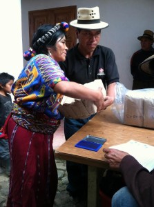 Chajul farmers receive ingredients for an organic fungicide and new seeds to help fight Roya. February 2014.