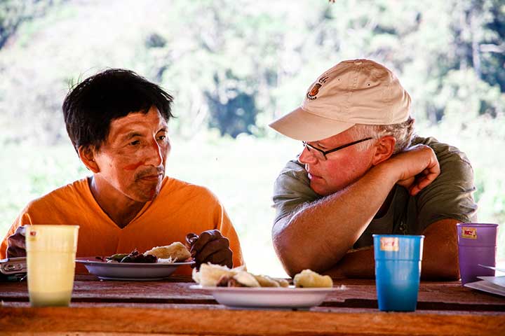 Bill Harris from Cafe Campesino talking with Don Julio a coffee trading partner in San Martin de Pangoa Peru